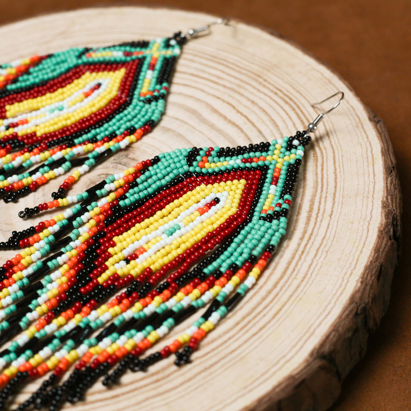 Sacred Feather Beaded Earrings – Vibrant Red, Green, and Yellow with Black Tassels