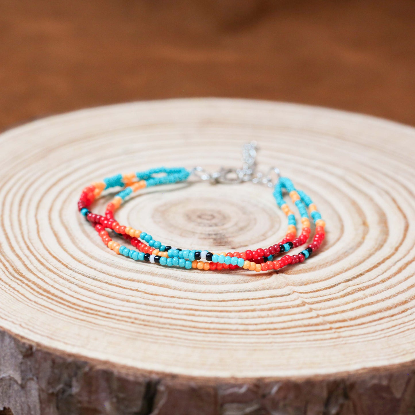 Sunset Glow Beaded Bracelet โ Multi-Color Design with Red, Yellow, and Turquoise