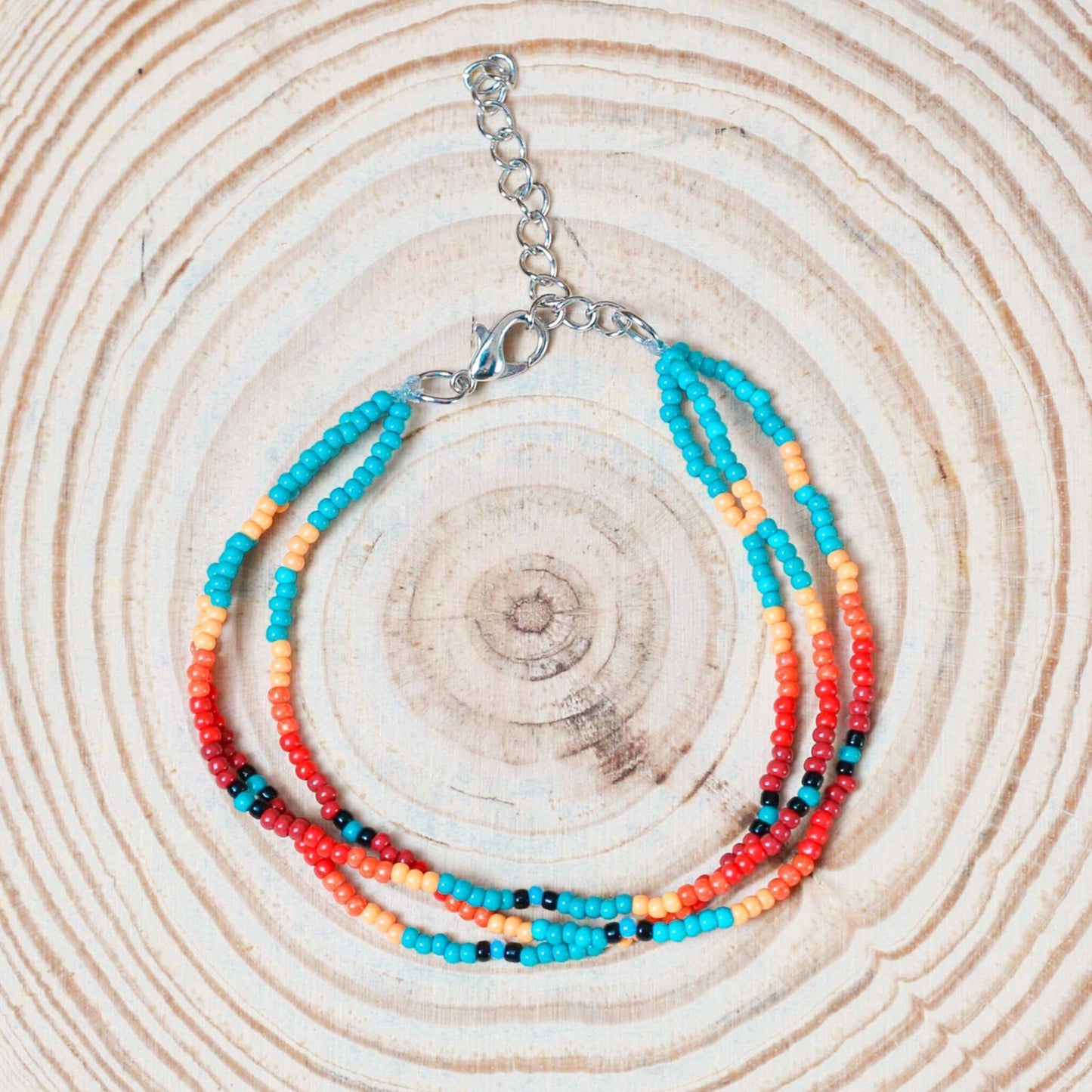 Sunset Glow Beaded Bracelet โ Multi-Color Design with Red, Yellow, and Turquoise