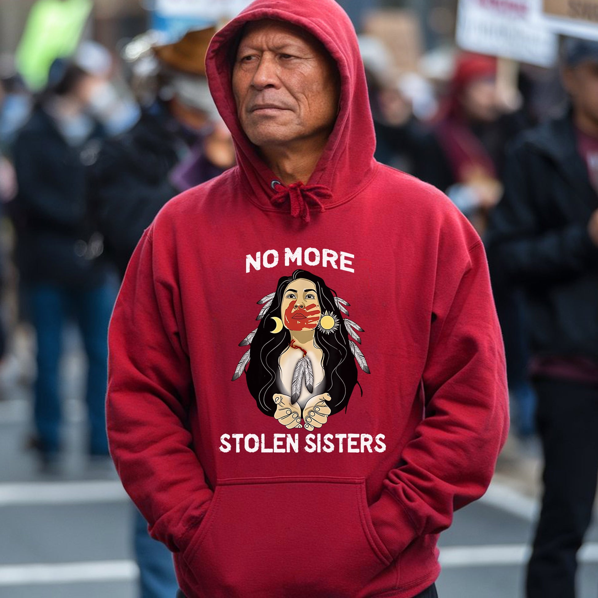 a man wearing a red hoodie with a picture of a woman on it