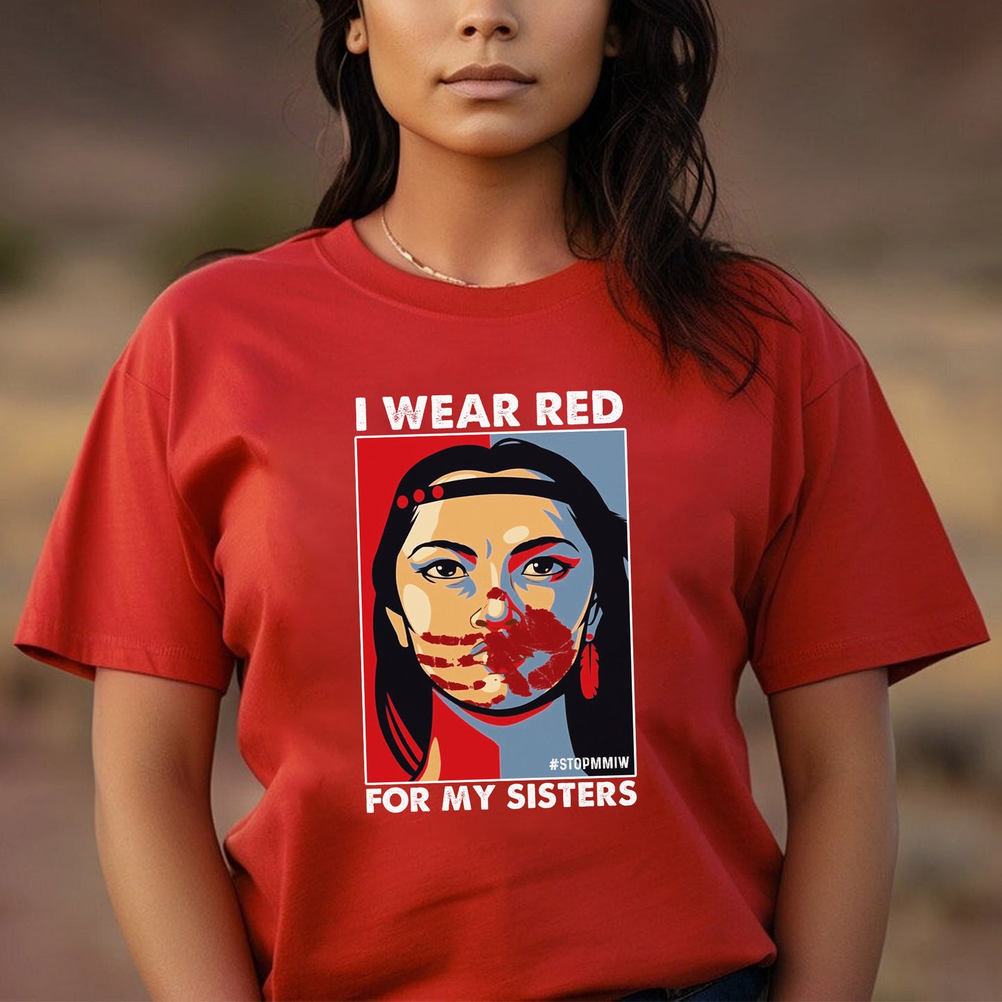 a woman wearing a red t - shirt with a picture of a woman's