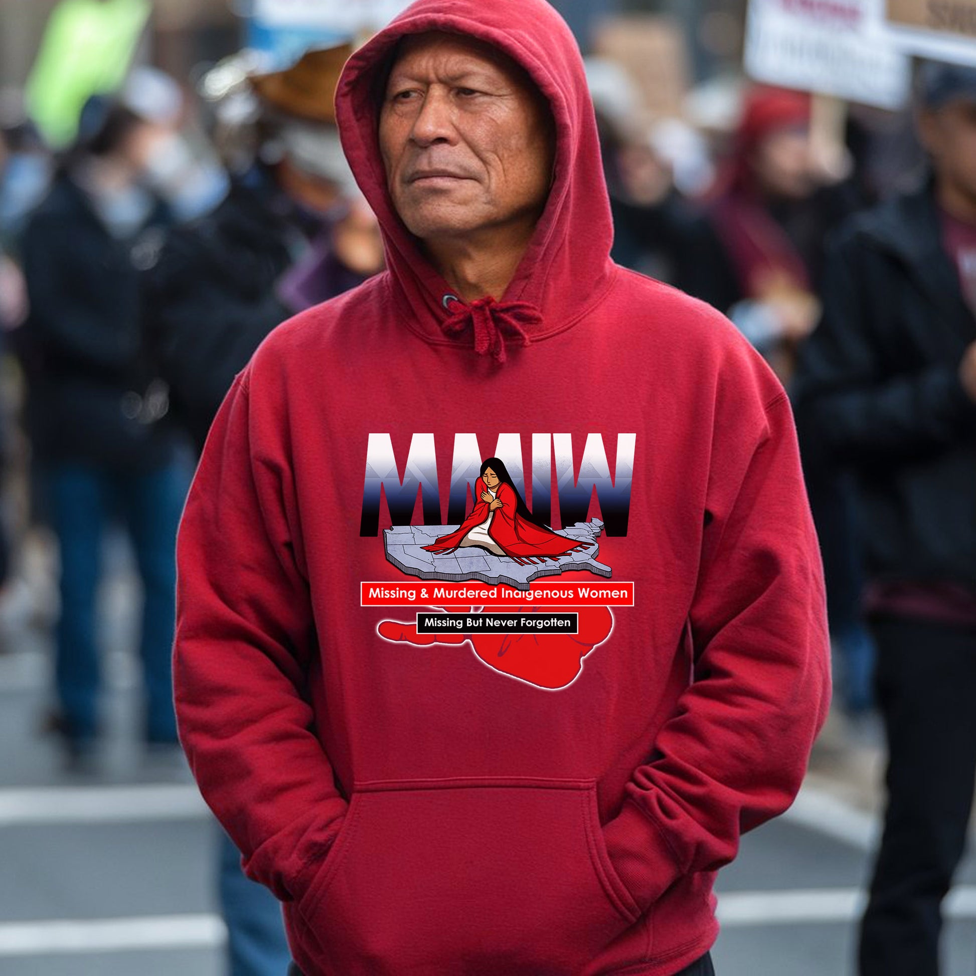 a man in a red hoodie standing in the street