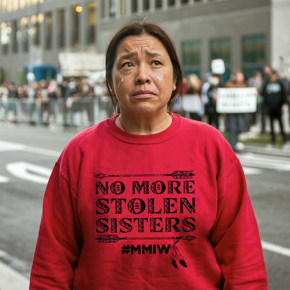 a woman in a red shirt is standing on the street