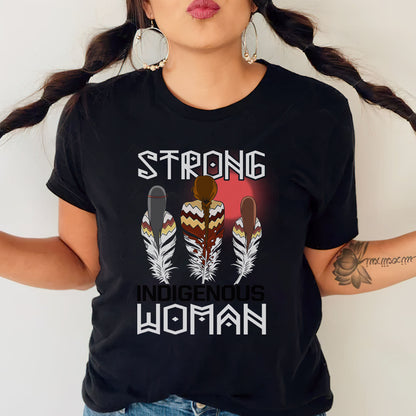 a woman wearing a black t - shirt that says strong is the woman