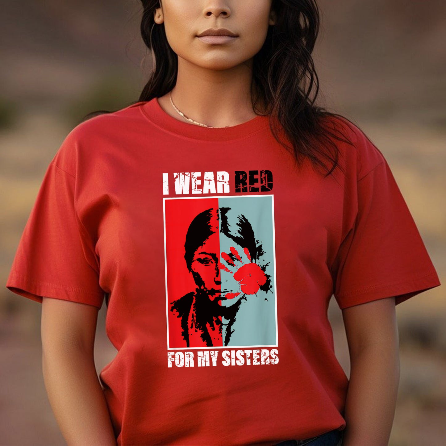 a woman wearing a red shirt with a picture of a man on it