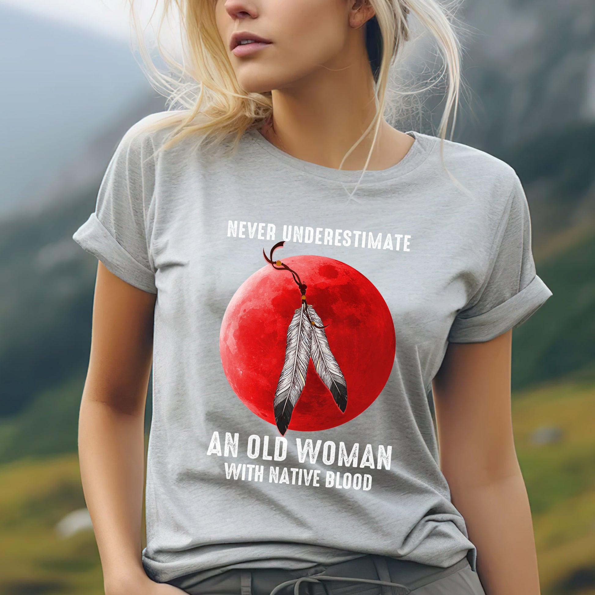 a woman wearing a t - shirt that says never underestimate an old