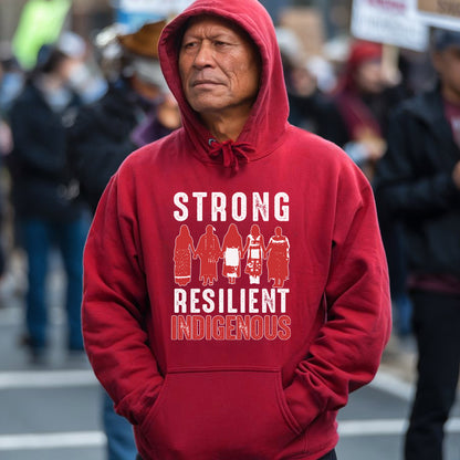 a man wearing a red hoodie with a slogan on it