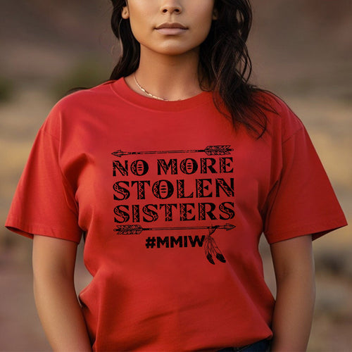 a woman wearing a red t - shirt that says no more stolen sisters mmw