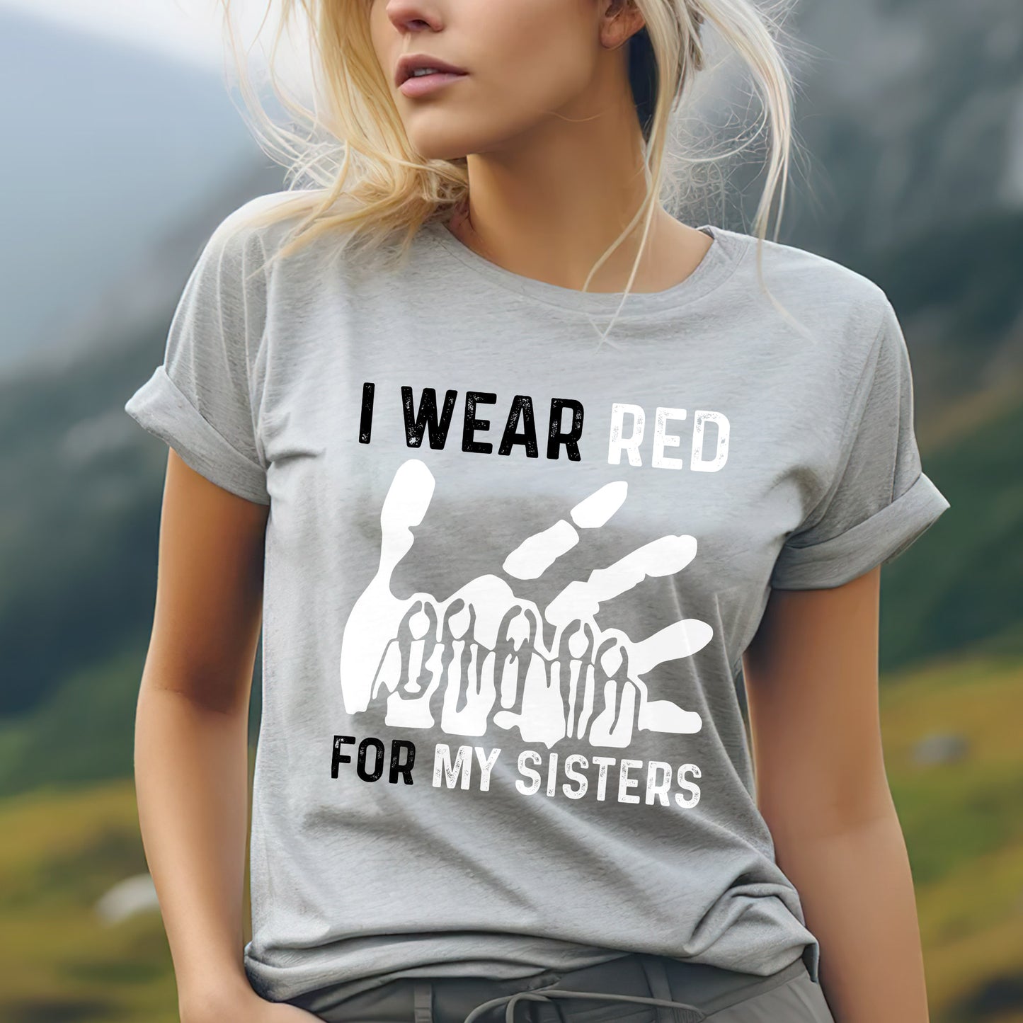 a woman wearing a t - shirt that says i wear red for my sisters