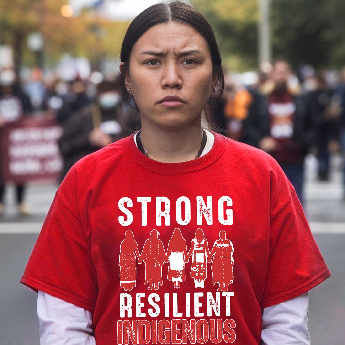 a woman in a red shirt is standing on the street