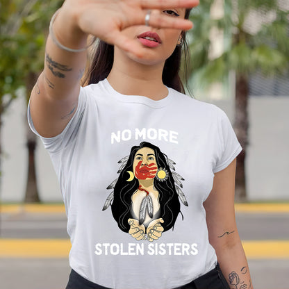 a woman wearing a t - shirt with a picture of a woman holding her hand