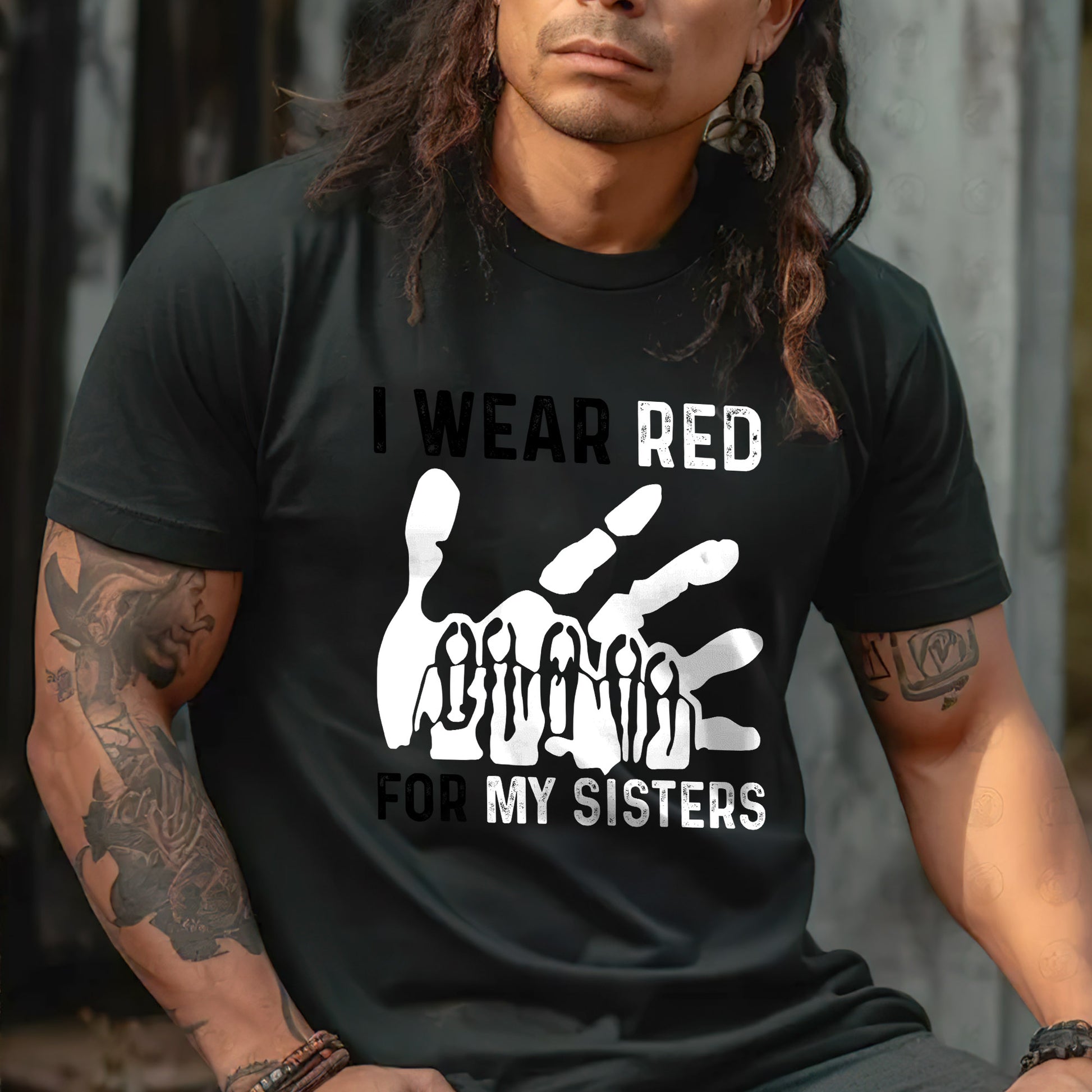 a man with long hair wearing a black shirt