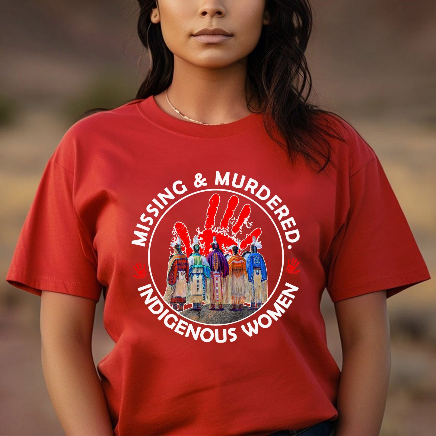 a woman wearing a red t - shirt that says nursing and murdered indigenous women