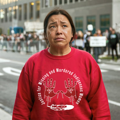 a woman in a red shirt standing in front of a crowd