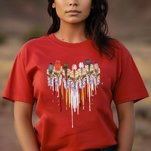 a woman wearing a red shirt with feathers on it